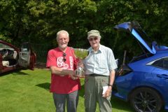 Barry Robinson collects the Wharfedale Trophy from Jeff White