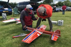 Barry discusses his latest model with Roger