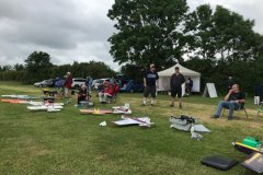 Models and Ines laid out, competitors survey the action