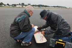 Two modellers starting up vintage stunt model