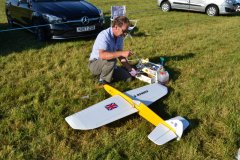 Control line stunt models being prepared for flight