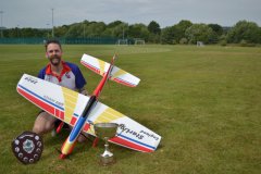 Stephen with model and trophies